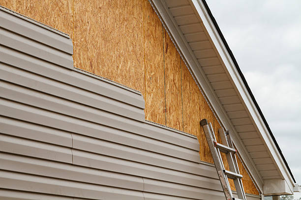 Professional Siding Contractor technician working in Haywood, VA